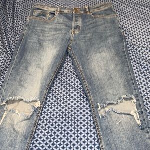 Grey and black denim jeans